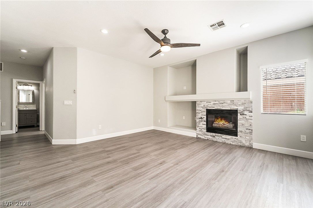 Vaulted living space with ceiling fan