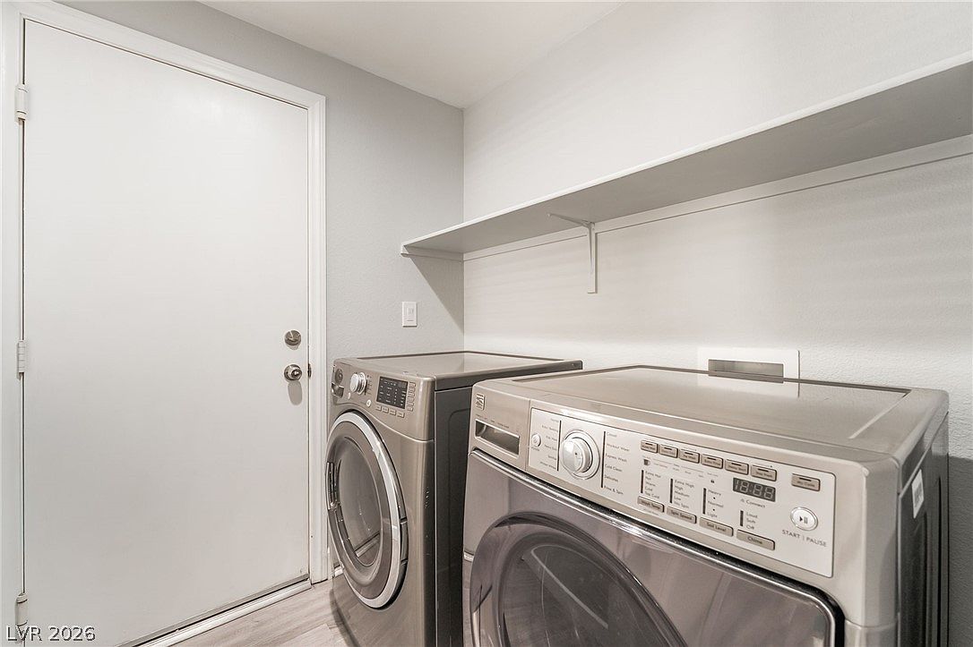 Laundry room with washer and dryer