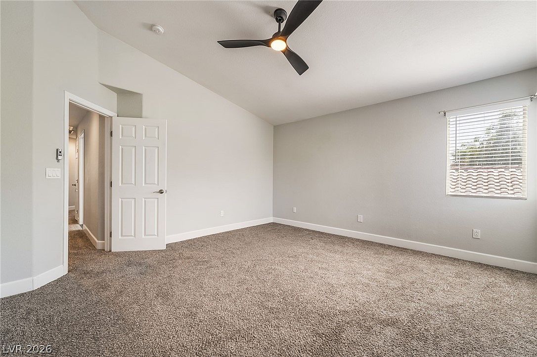 Carpeted secondary bedroom