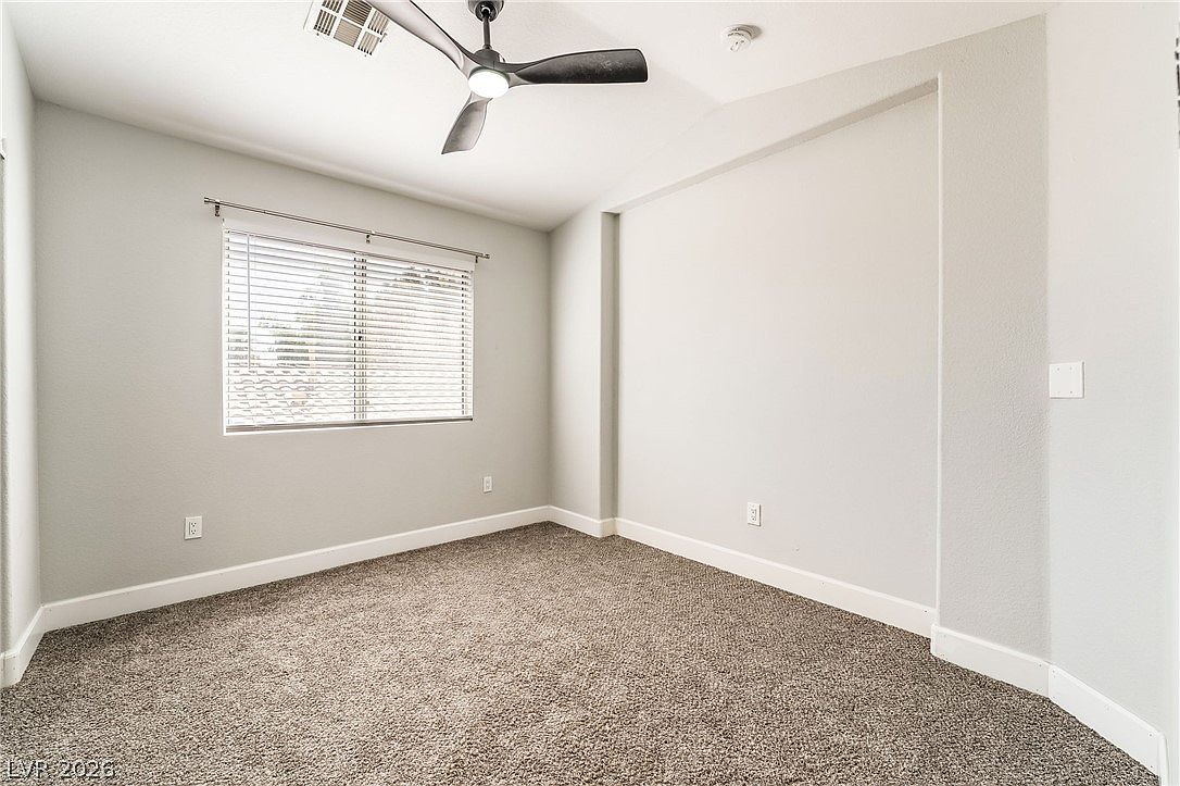 Corner bedroom with two windows